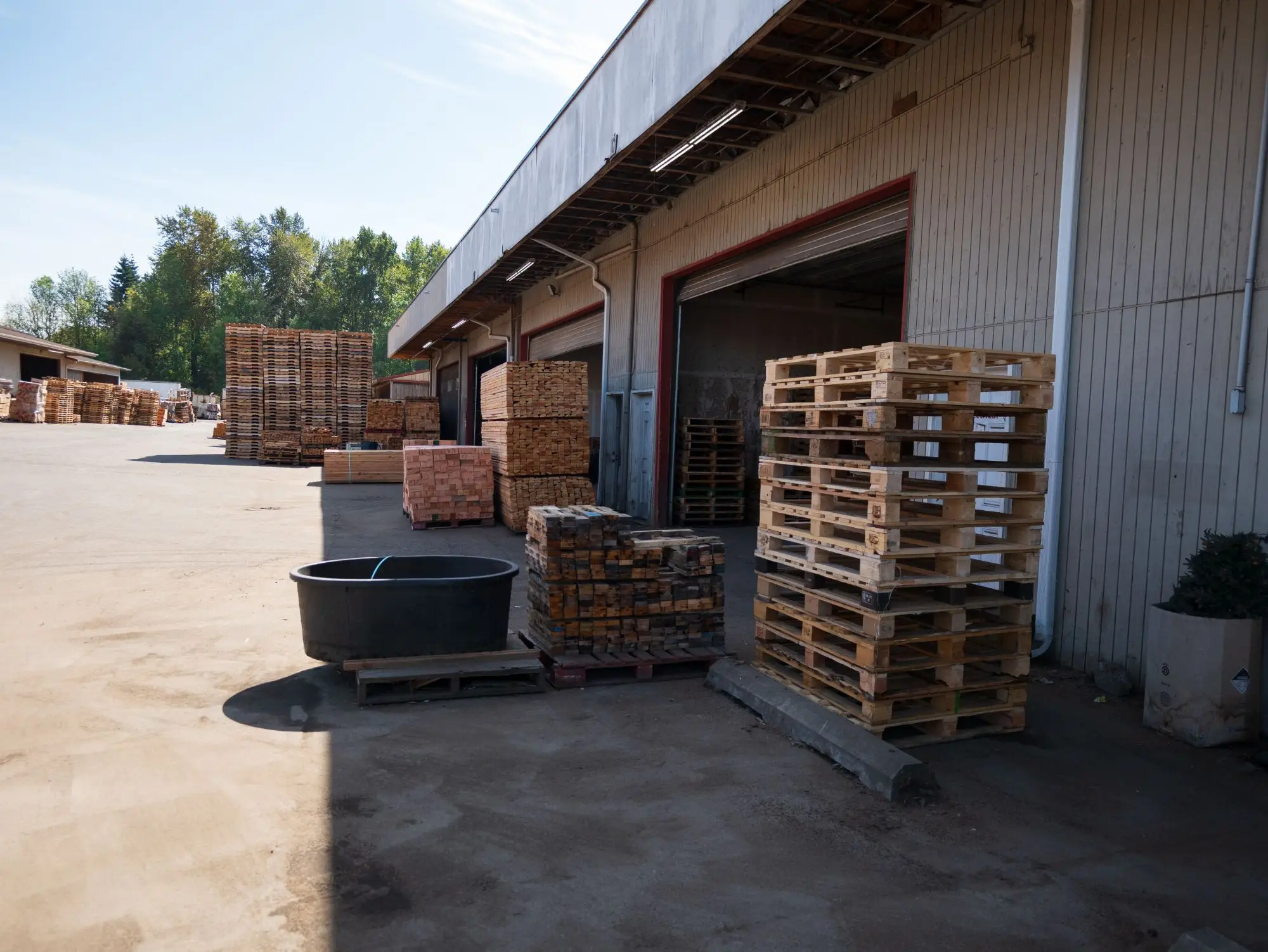 Stacks of cut dunnage lumber at the APSS yard in Tacoma, WA, ready for blocking and bracing loads