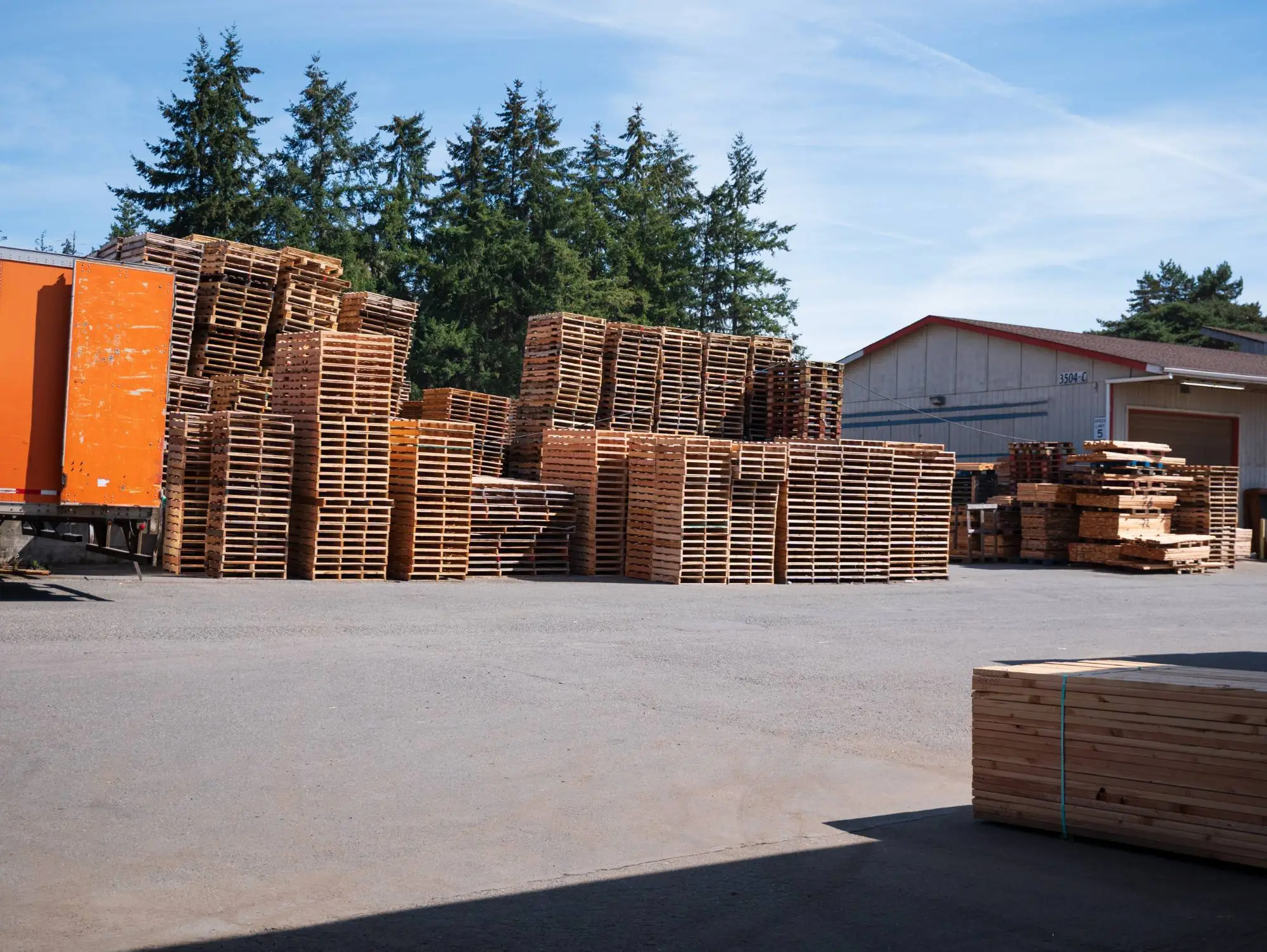 Thousands of wood pallets stacked across the APSS yard in Tacoma, WA